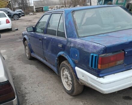 Синий Ниссан Блюберд, объемом двигателя 2 л и пробегом 108 тыс. км за 450 $, фото 3 на Automoto.ua