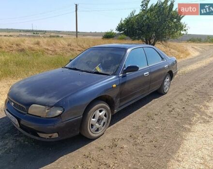 Синий Ниссан Блюберд, объемом двигателя 2 л и пробегом 370 тыс. км за 1200 $, фото 2 на Automoto.ua