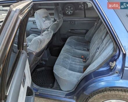 Синій Ніссан Блюберд, об'ємом двигуна 2 л та пробігом 443 тис. км за 1700 $, фото 4 на Automoto.ua