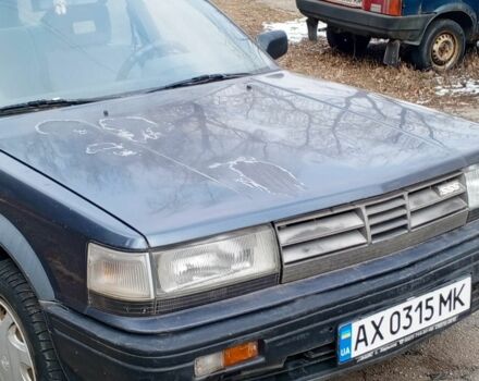 Синий Ниссан Блюберд, объемом двигателя 2 л и пробегом 220 тыс. км за 700 $, фото 1 на Automoto.ua