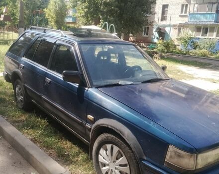Синій Ніссан Блюберд, об'ємом двигуна 2 л та пробігом 256 тис. км за 606 $, фото 1 на Automoto.ua