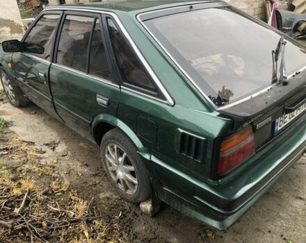 Зелений Ніссан Блюберд, об'ємом двигуна 2 л та пробігом 200 тис. км за 1200 $, фото 4 на Automoto.ua
