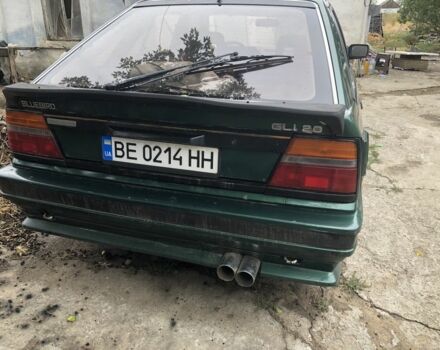 Зелений Ніссан Блюберд, об'ємом двигуна 2 л та пробігом 200 тис. км за 1200 $, фото 3 на Automoto.ua