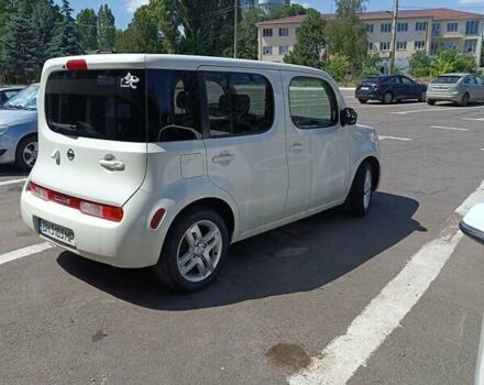 Белый Ниссан Куб, объемом двигателя 1.6 л и пробегом 142 тыс. км за 7500 $, фото 5 на Automoto.ua