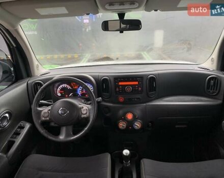 Белый Ниссан Куб, объемом двигателя 1.8 л и пробегом 195 тыс. км за 6000 $, фото 16 на Automoto.ua
