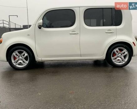 Белый Ниссан Куб, объемом двигателя 1.8 л и пробегом 195 тыс. км за 6000 $, фото 1 на Automoto.ua