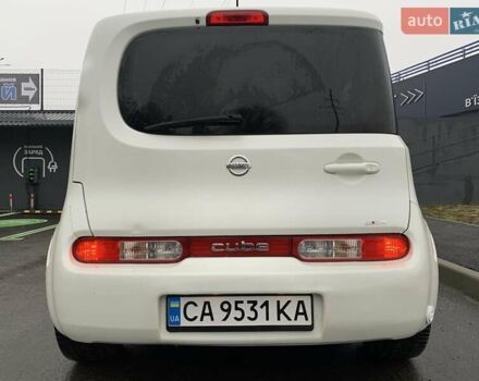Белый Ниссан Куб, объемом двигателя 1.8 л и пробегом 195 тыс. км за 6000 $, фото 3 на Automoto.ua
