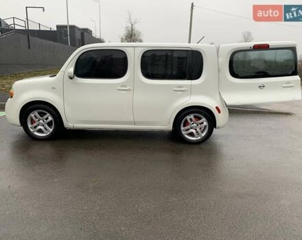 Белый Ниссан Куб, объемом двигателя 1.8 л и пробегом 195 тыс. км за 6000 $, фото 4 на Automoto.ua