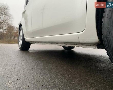 Белый Ниссан Куб, объемом двигателя 1.8 л и пробегом 195 тыс. км за 6000 $, фото 6 на Automoto.ua