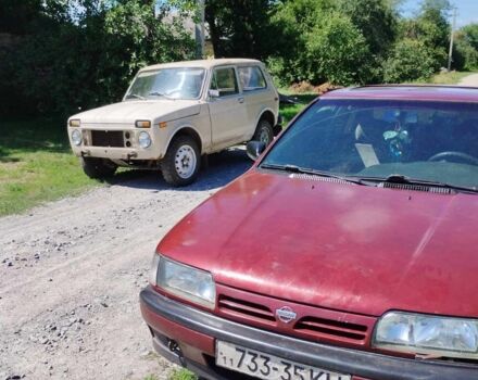 Красный Ниссан Другая, объемом двигателя 1.6 л и пробегом 328 тыс. км за 1700 $, фото 2 на Automoto.ua