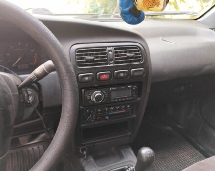 Красный Ниссан Другая, объемом двигателя 1.6 л и пробегом 328 тыс. км за 1700 $, фото 4 на Automoto.ua