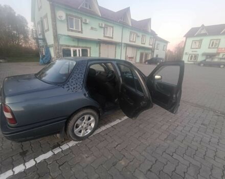 Сірий Ніссан Інша, об'ємом двигуна 1.4 л та пробігом 174 тис. км за 2200 $, фото 2 на Automoto.ua