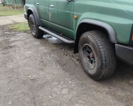 Зеленый Ниссан Другая, объемом двигателя 4 л и пробегом 300 тыс. км за 14500 $, фото 1 на Automoto.ua