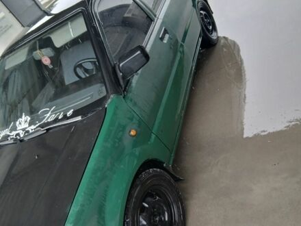 Зелений Ніссан Інша, об'ємом двигуна 1.6 л та пробігом 400 тис. км за 600 $, фото 1 на Automoto.ua