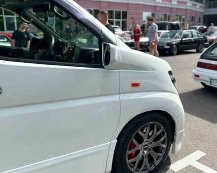 Білий Ніссан Ельгранд, об'ємом двигуна 3.5 л та пробігом 235 тис. км за 10500 $, фото 1 на Automoto.ua