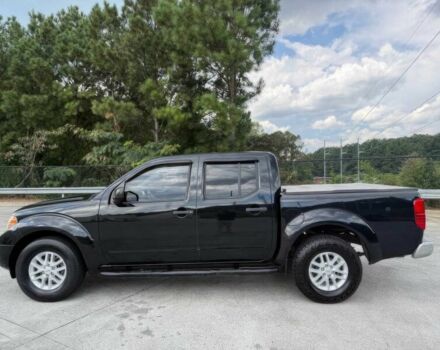 Черный Ниссан Фронтиер, объемом двигателя 4 л и пробегом 50 тыс. км за 25000 $, фото 4 на Automoto.ua