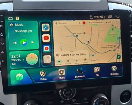 Серый Ниссан Фронтиер, объемом двигателя 4 л и пробегом 200 тыс. км за 15690 $, фото 9 на Automoto.ua