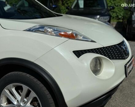 Белый Ниссан Жук, объемом двигателя 1.6 л и пробегом 257 тыс. км за 10590 $, фото 3 на Automoto.ua