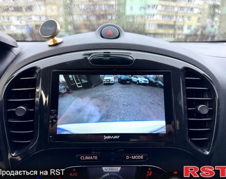 Белый Ниссан Жук, объемом двигателя 1.6 л и пробегом 145 тыс. км за 9700 $, фото 13 на Automoto.ua