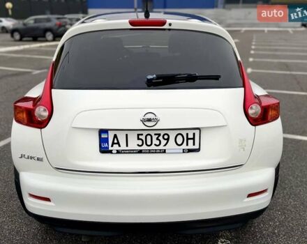 Белый Ниссан Жук, объемом двигателя 1.6 л и пробегом 165 тыс. км за 9500 $, фото 5 на Automoto.ua