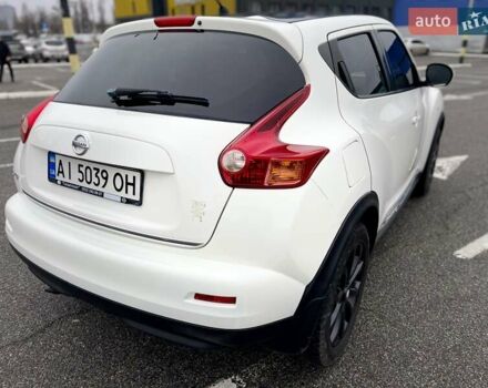 Белый Ниссан Жук, объемом двигателя 1.6 л и пробегом 165 тыс. км за 9500 $, фото 6 на Automoto.ua
