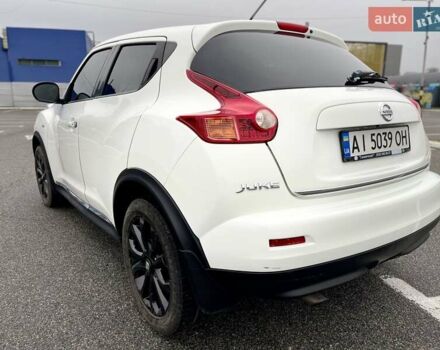 Белый Ниссан Жук, объемом двигателя 1.6 л и пробегом 165 тыс. км за 9500 $, фото 4 на Automoto.ua