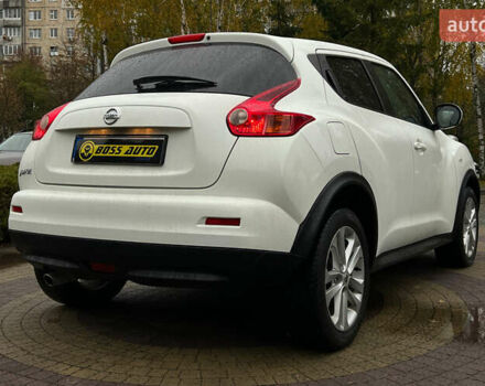 Белый Ниссан Жук, объемом двигателя 1.6 л и пробегом 165 тыс. км за 8999 $, фото 6 на Automoto.ua