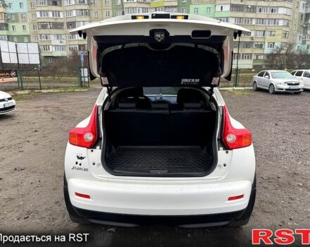 Белый Ниссан Жук, объемом двигателя 1.6 л и пробегом 145 тыс. км за 9700 $, фото 7 на Automoto.ua