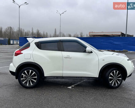 Белый Ниссан Жук, объемом двигателя 1.6 л и пробегом 148 тыс. км за 9800 $, фото 4 на Automoto.ua