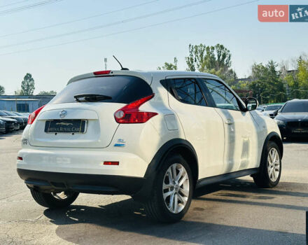 Белый Ниссан Жук, объемом двигателя 1.6 л и пробегом 133 тыс. км за 10800 $, фото 9 на Automoto.ua