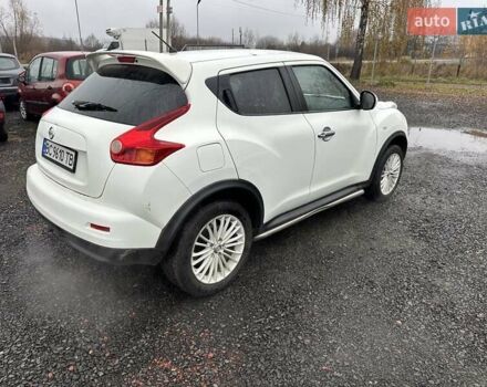 Белый Ниссан Жук, объемом двигателя 1.6 л и пробегом 157 тыс. км за 9300 $, фото 2 на Automoto.ua