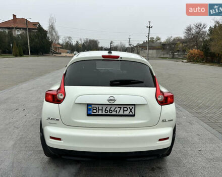 Белый Ниссан Жук, объемом двигателя 1.6 л и пробегом 265 тыс. км за 8900 $, фото 6 на Automoto.ua