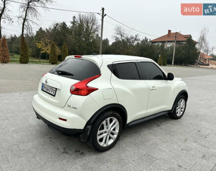 Белый Ниссан Жук, объемом двигателя 1.6 л и пробегом 265 тыс. км за 8900 $, фото 7 на Automoto.ua