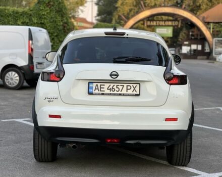 Белый Ниссан Жук, объемом двигателя 1.6 л и пробегом 150 тыс. км за 12237 $, фото 2 на Automoto.ua