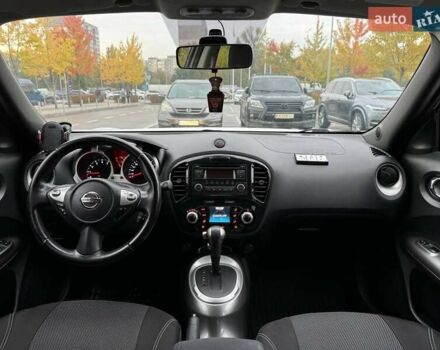 Белый Ниссан Жук, объемом двигателя 1.6 л и пробегом 175 тыс. км за 12490 $, фото 14 на Automoto.ua