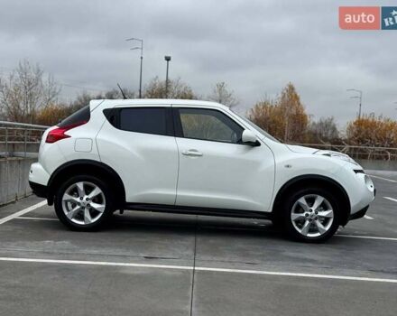 Белый Ниссан Жук, объемом двигателя 1.6 л и пробегом 115 тыс. км за 9900 $, фото 4 на Automoto.ua