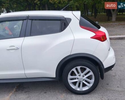 Белый Ниссан Жук, объемом двигателя 1.6 л и пробегом 207 тыс. км за 9800 $, фото 6 на Automoto.ua