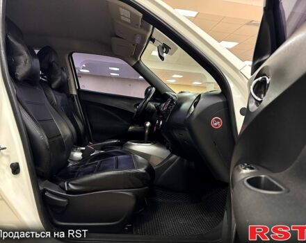 Белый Ниссан Жук, объемом двигателя 1.6 л и пробегом 141 тыс. км за 10900 $, фото 7 на Automoto.ua