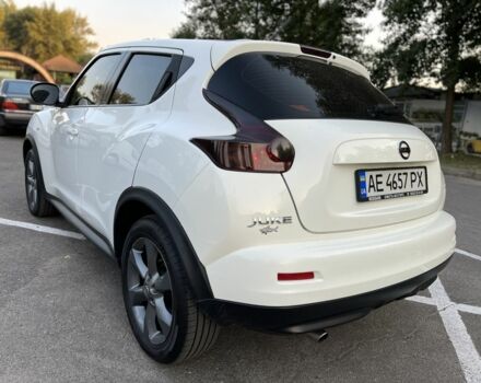 Белый Ниссан Жук, объемом двигателя 1.6 л и пробегом 150 тыс. км за 12237 $, фото 3 на Automoto.ua