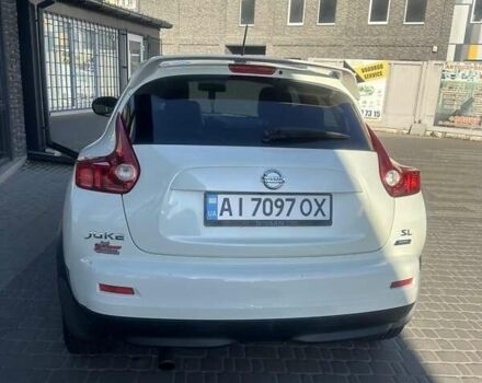 Белый Ниссан Жук, объемом двигателя 1.62 л и пробегом 100 тыс. км за 9900 $, фото 2 на Automoto.ua