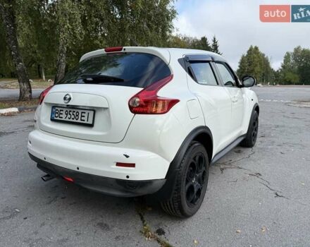 Белый Ниссан Жук, объемом двигателя 1.6 л и пробегом 175 тыс. км за 9000 $, фото 2 на Automoto.ua