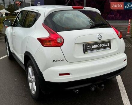 Белый Ниссан Жук, объемом двигателя 1.6 л и пробегом 175 тыс. км за 12490 $, фото 5 на Automoto.ua