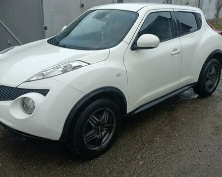 Белый Ниссан Жук, объемом двигателя 1.46 л и пробегом 165 тыс. км за 11400 $, фото 2 на Automoto.ua