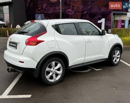 Белый Ниссан Жук, объемом двигателя 1.6 л и пробегом 175 тыс. км за 12490 $, фото 7 на Automoto.ua