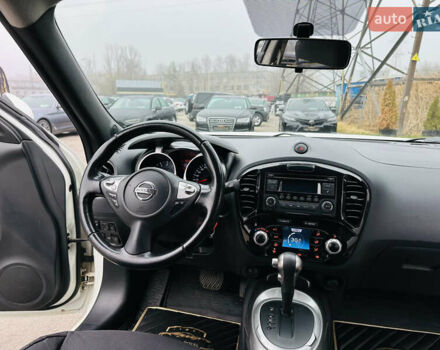 Белый Ниссан Жук, объемом двигателя 1.57 л и пробегом 106 тыс. км за 11500 $, фото 19 на Automoto.ua