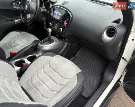 Белый Ниссан Жук, объемом двигателя 1.6 л и пробегом 106 тыс. км за 10400 $, фото 29 на Automoto.ua