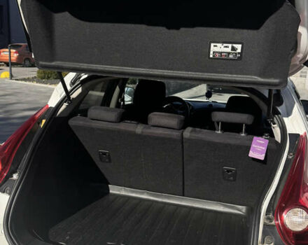 Белый Ниссан Жук, объемом двигателя 1.6 л и пробегом 158 тыс. км за 10500 $, фото 5 на Automoto.ua