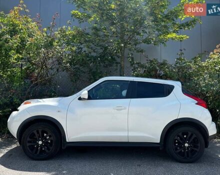 Белый Ниссан Жук, объемом двигателя 1.6 л и пробегом 170 тыс. км за 11000 $, фото 5 на Automoto.ua