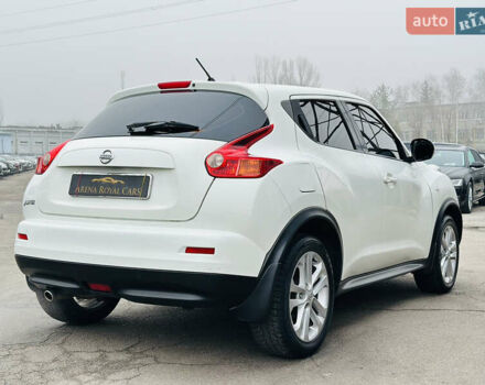 Белый Ниссан Жук, объемом двигателя 1.57 л и пробегом 106 тыс. км за 11500 $, фото 9 на Automoto.ua