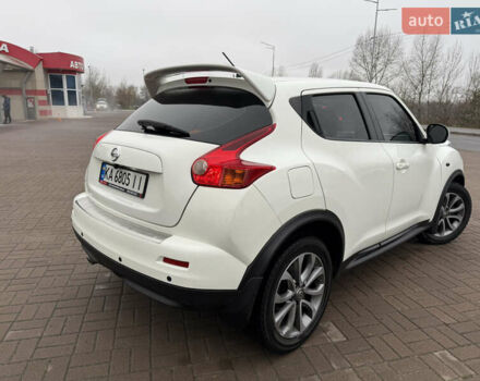 Белый Ниссан Жук, объемом двигателя 1.6 л и пробегом 106 тыс. км за 10400 $, фото 5 на Automoto.ua